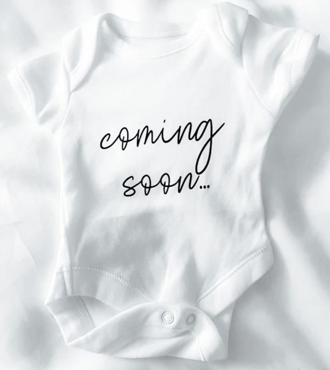 Photo de vêtements de bébé postée par Lindsay Lohan sur Instagram