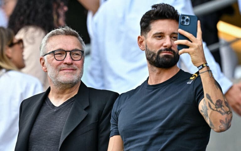 French Radio host Laurent RUQUIER and Hugo MANOS attends the French Ligue 1 Uber Eats soccer match between Havre Athletic Club and Lille Olympique Sporting Club at Stade Oceane on October 1, 2023 in Le Havre, France. (Photo by Baptiste Fernandez/Icon Sport) - Photo by Icon Sport Photo by Baptiste Fernandez/Icon Sport Havre Athletic Club v Lille Olympique Sporting Club- Ligue 1 Uber Eats