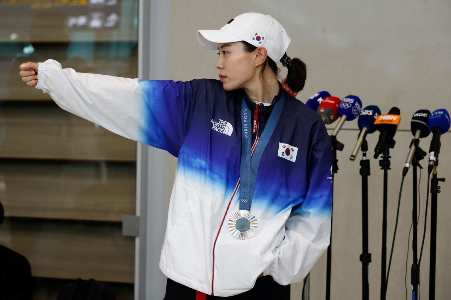 South Korean pistol shooter Kim Ye-ji, whose video of breaking a world record at the Olympics went viral on social media, arrives at airport