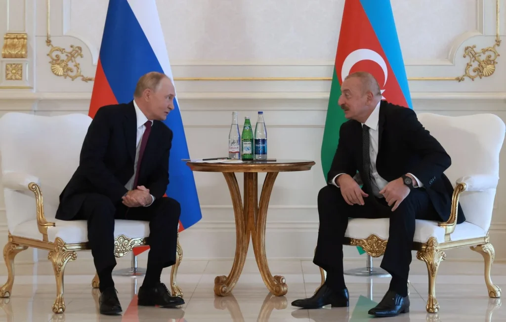 1444x920_in-this-pool-photograph-distributed-by-russian-state-agency-sputnik-azerbaijan-s-president-ilham-aliyev-r-attends-a-meeting-with-russia-s-president-vladimir-putin-l-at-the-zagulba-presidential-residence-outside-baku-on-august-19-2
