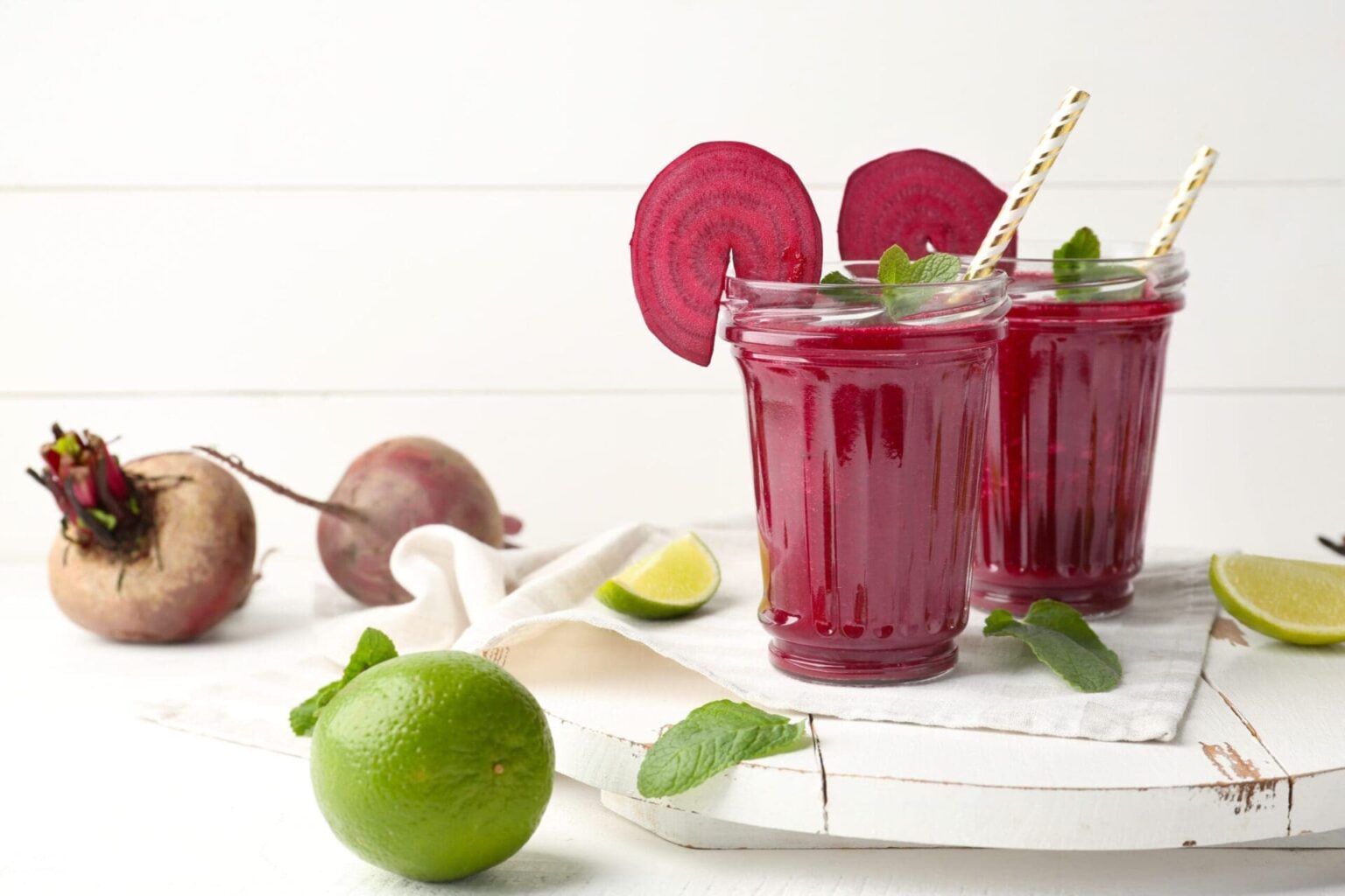 Glasses of fresh beet smoothie on table