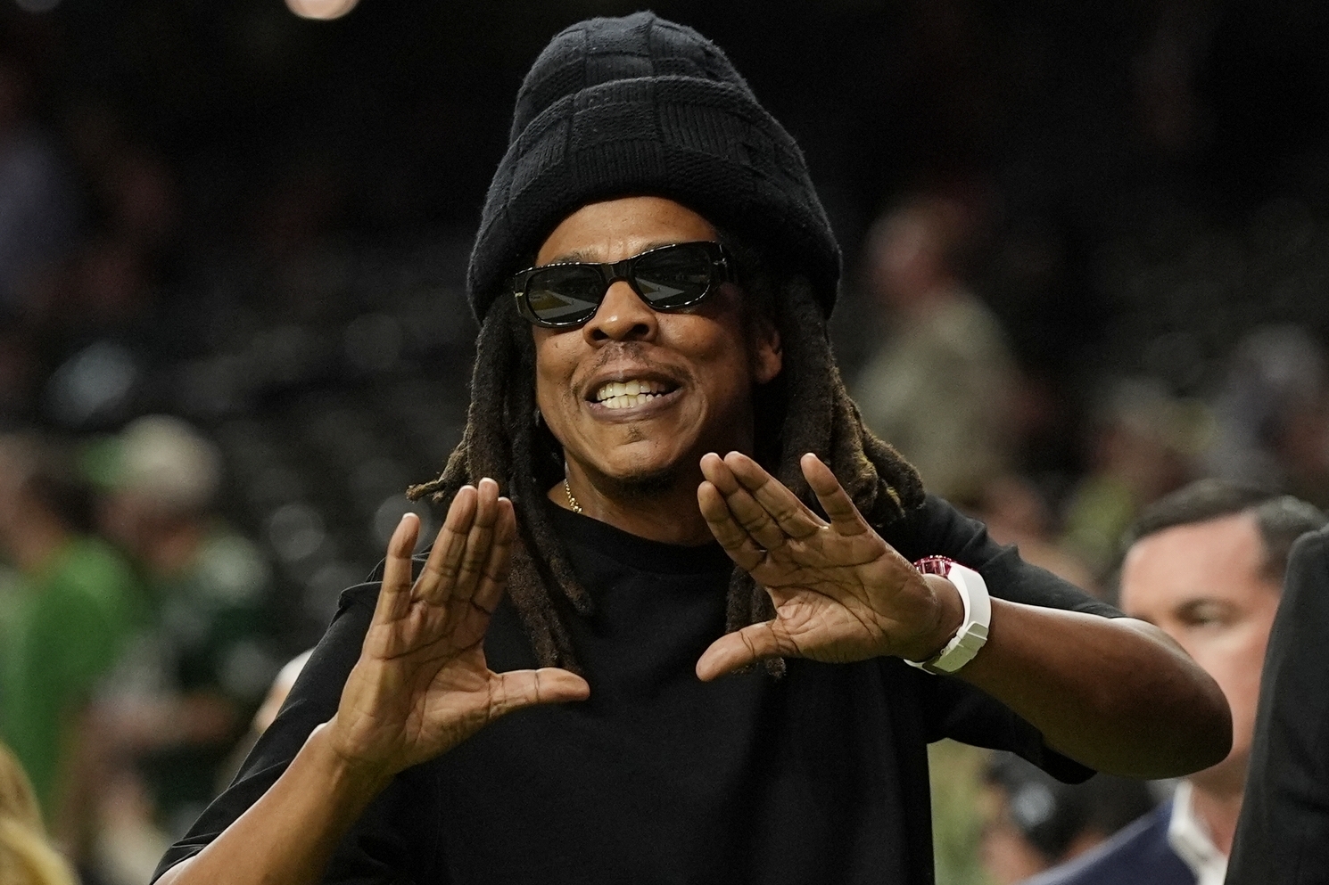 Jay-Z gestures from the sidelines prior to the NFL Super Bowl 59 football game between the Philadelphia Eagles and the Kansas City Chiefs, Sunday, Feb. 9, 2025, in New Orleans. (AP Photo/Frank Franklin II)