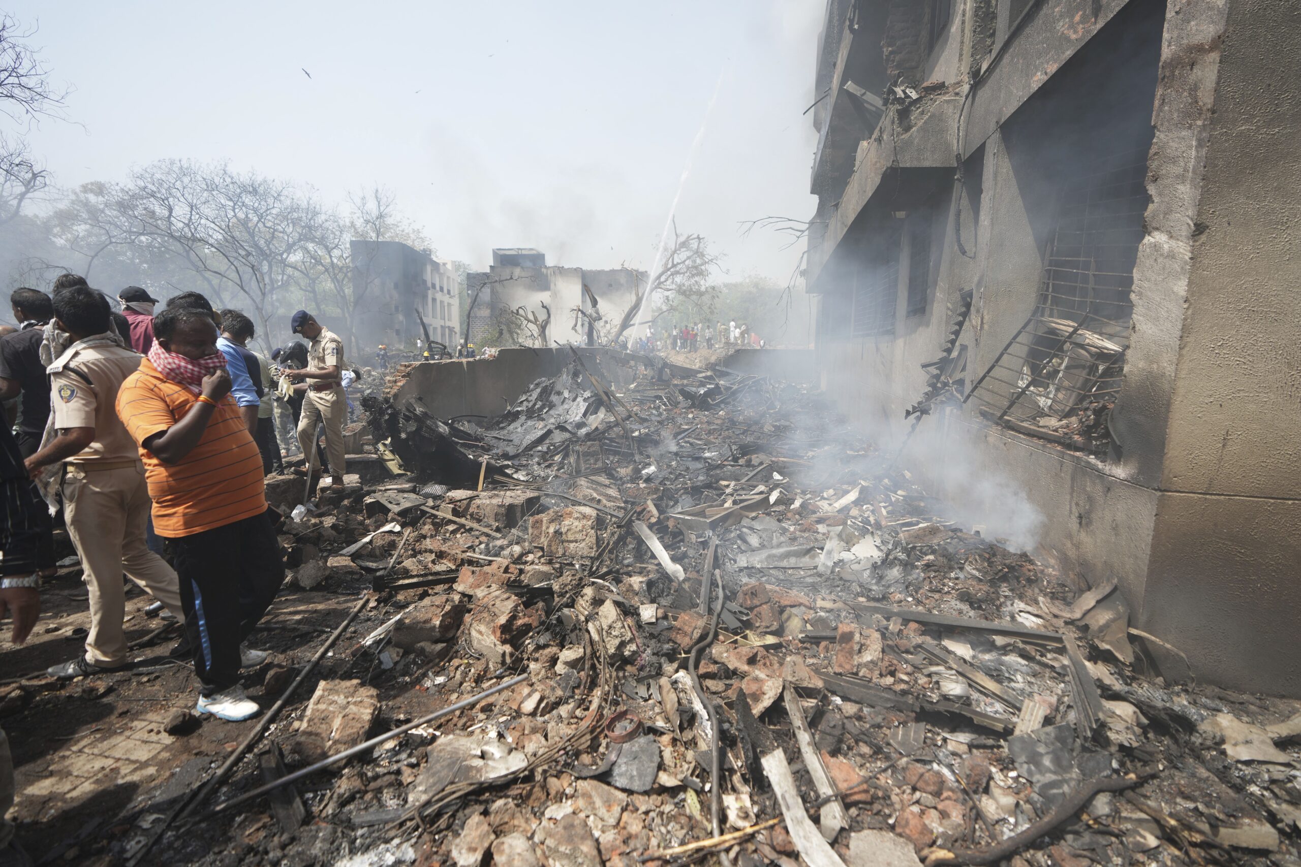 Members Of The Security Forces Work At The Site Of An Airplane That Crashed In India'S Northwestern City Of Ahmedabad In Gujarat State, Thursday, June 12, 2025. (Ap Photo/Ajit Solanki) Ap Photo/Ajit Solanki