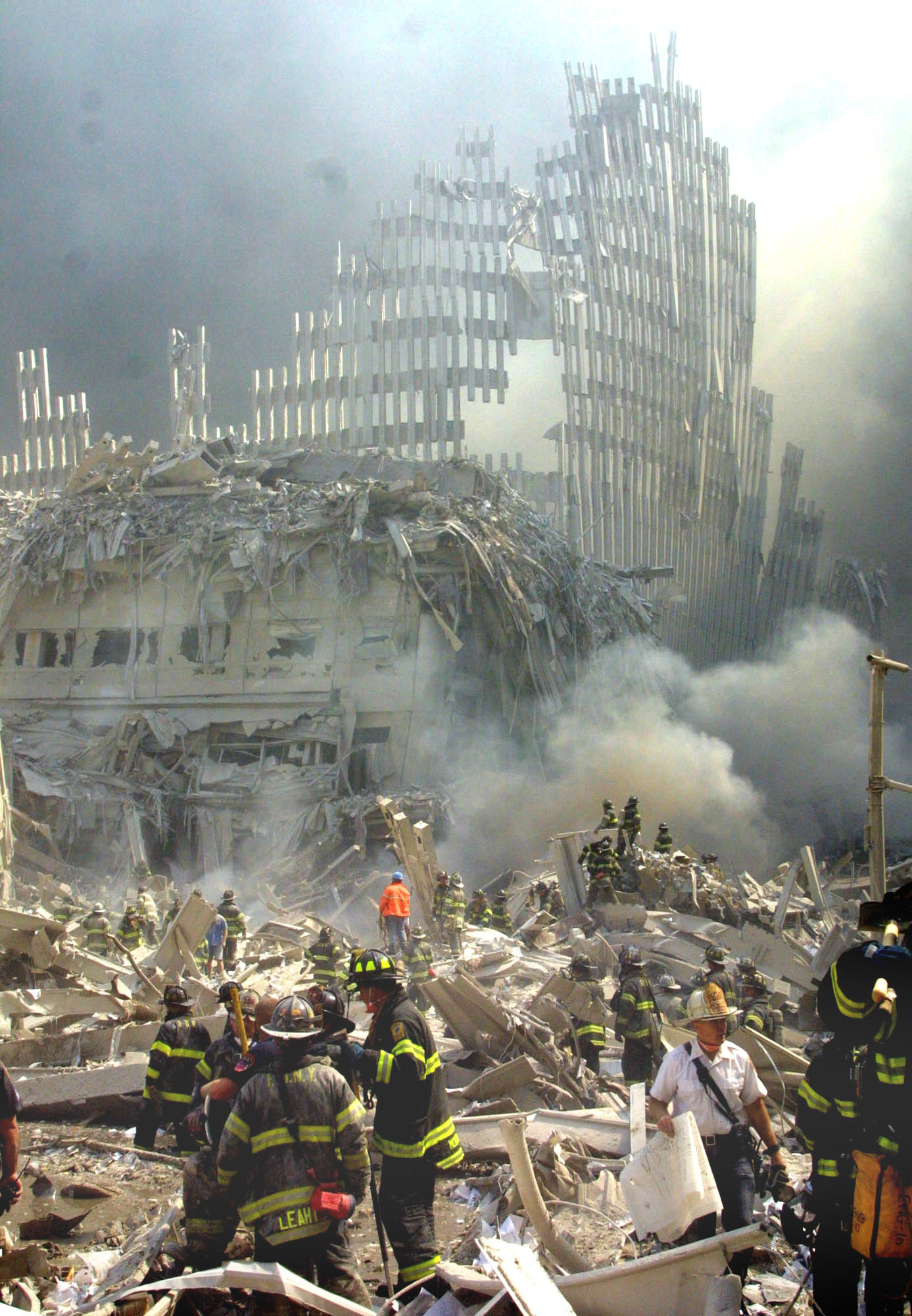 File - In This Sept. 11, 2001 File Photo, A Shell Of What Was Once Part Of The Facade Of One Of The Twin Towers Of New York'S World Trade Center Rises Above The Rubble That Remains After Both Towers Were Destroyed In The Terrorist Attacks. Researchers Tracking Responders Who Became Ill After Working At The World Trade Center Site Found Many Had Lung Problems More Than Five Years After The Attacks. (Ap Photo/Shawn Baldwin, File) Ap Photo/Shawn Baldwin, File