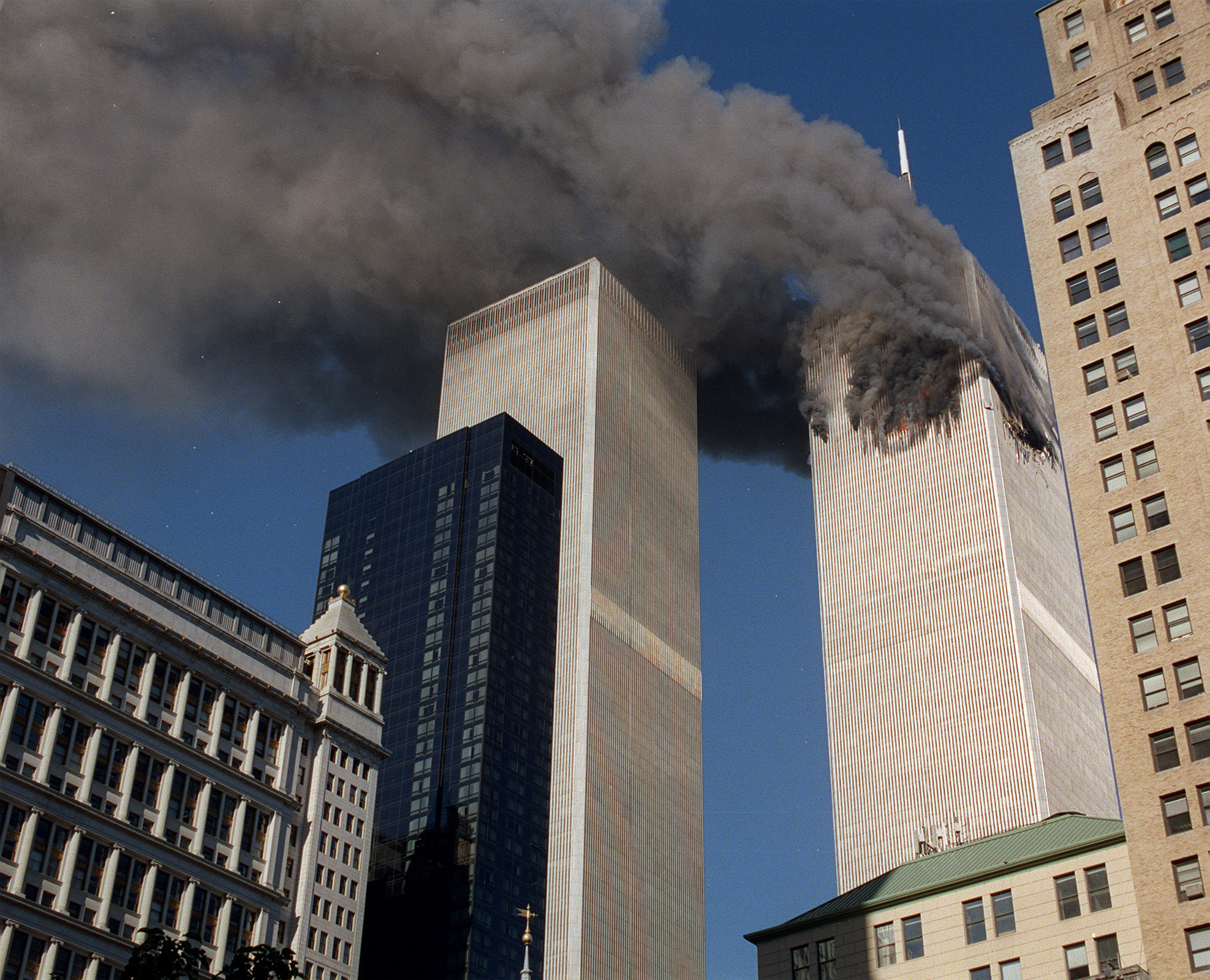 First Of A Series Of Four Pictures---Smoke Pours From One Of The Towers Of The World Trade Center Tuesday, September 11, 2001, After Terrorists Crashed A Plane Into The Building. Minutes Later A Second Plane Was Crashed Into The Second Tower. (Ap Photo/Chao Soi Cheong) Ap Photo/Chao Soi Cheong