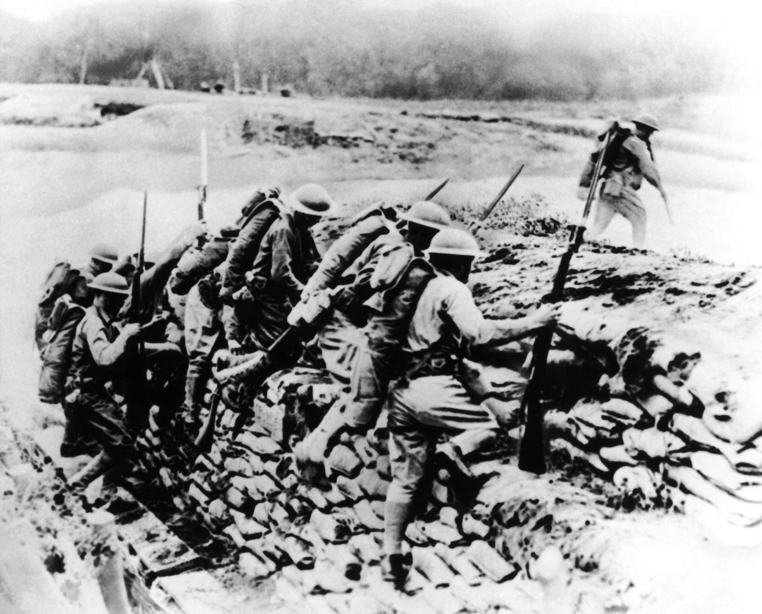 World War I Came To An End On Nov. 11, 1918, When The Signed Armistice Came Into Effect, But The Aftermath Of The War Is Still With Us. The United States, Which Sent Thousands Of Doughboys To Fight In France Like Those Shown Charging Over The Top Of A Trench, In 1917, Emerged A Reluctant Leader Of The World. (Ap Photo) Ap Photo