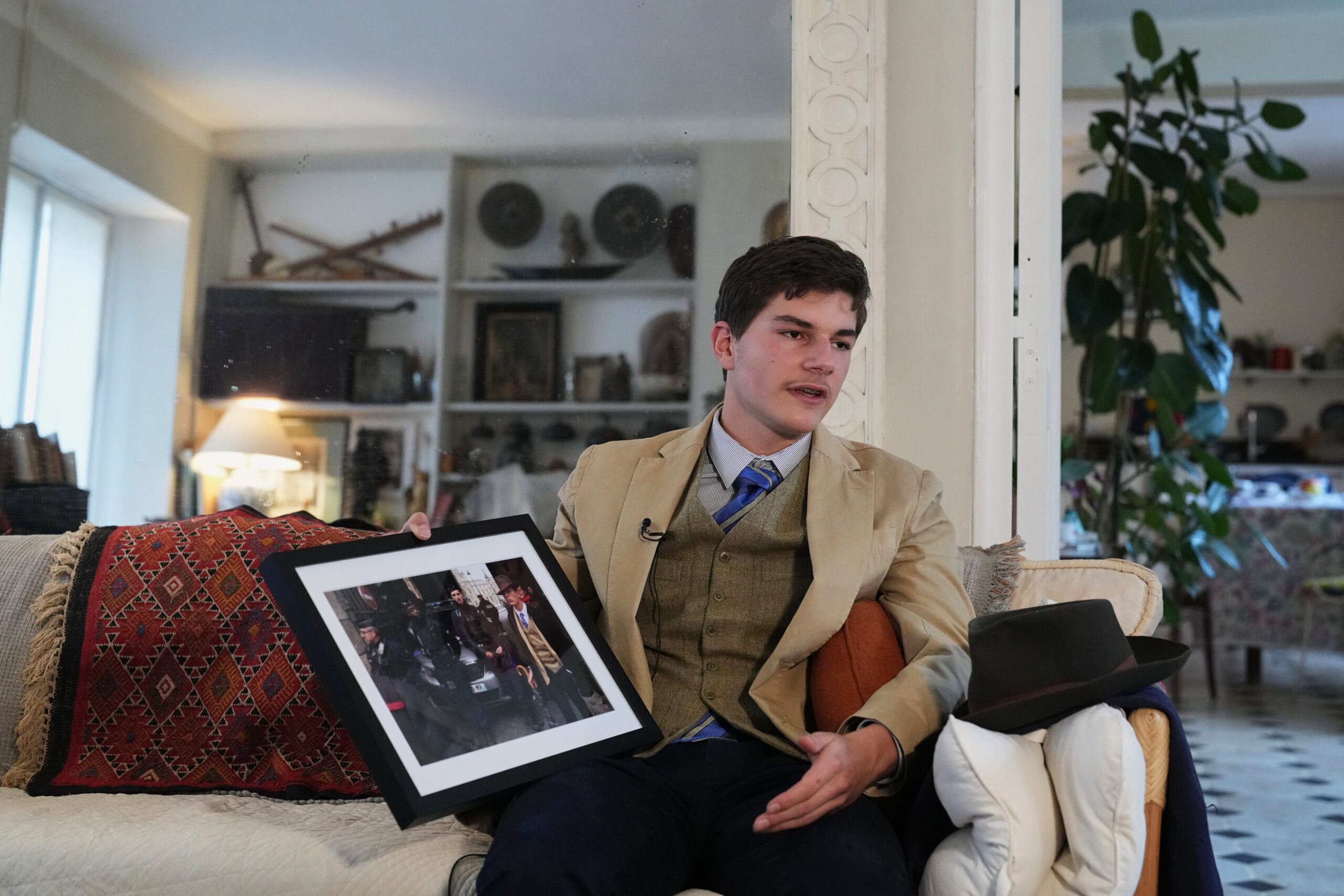 Pedro Elias Garzon Delvaux Holds An Associated Press Photo Of Him Outside The Louvre On The Day Of The Crown Jewels Heist, During An Interview With Associated Press, Saturday, Nov. 8, 2025, In Rambouillet, South Of Paris. (Ap Photo/Thibault Camus) Ap Photo/Thibault Camus