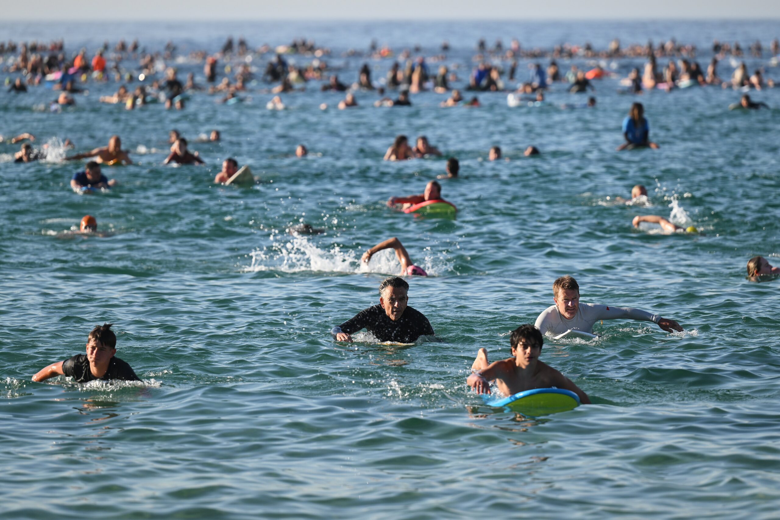 File - Surfers And Swimmers Head Out To The Ocean As A Tribute Following Sunday'S Shooting At Bondi Beach, In Sydney, Friday, Dec. 19, 2025. (Ap Photo/Steve Markham,File) Ap Photo/Steve Markham,File