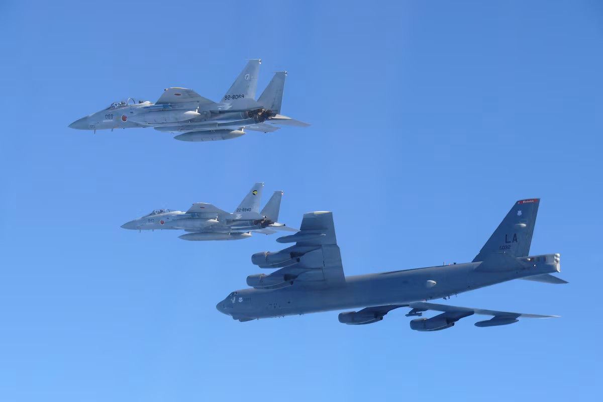 American bombers participate in a show of force with Japanese fighter jets following Sino-Russian maneuvers.