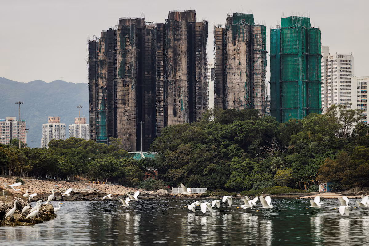Hong Kong offers to buy back apartments destroyed by the deadly fire in a residential tower