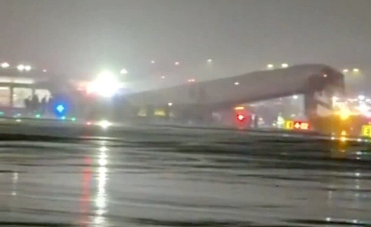 An Air Canada plane crashes into a vehicle on the ground at LaGuardia Airport in New York.