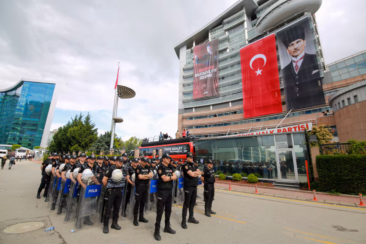 Turkish police storm the opposition headquarters after the ouster of its leaders