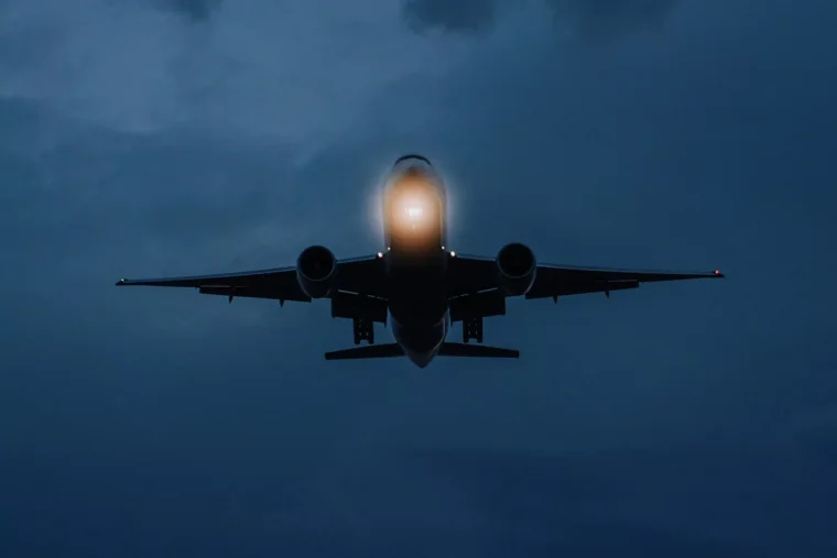 Why do most flights to Europe cross the Atlantic at night?
