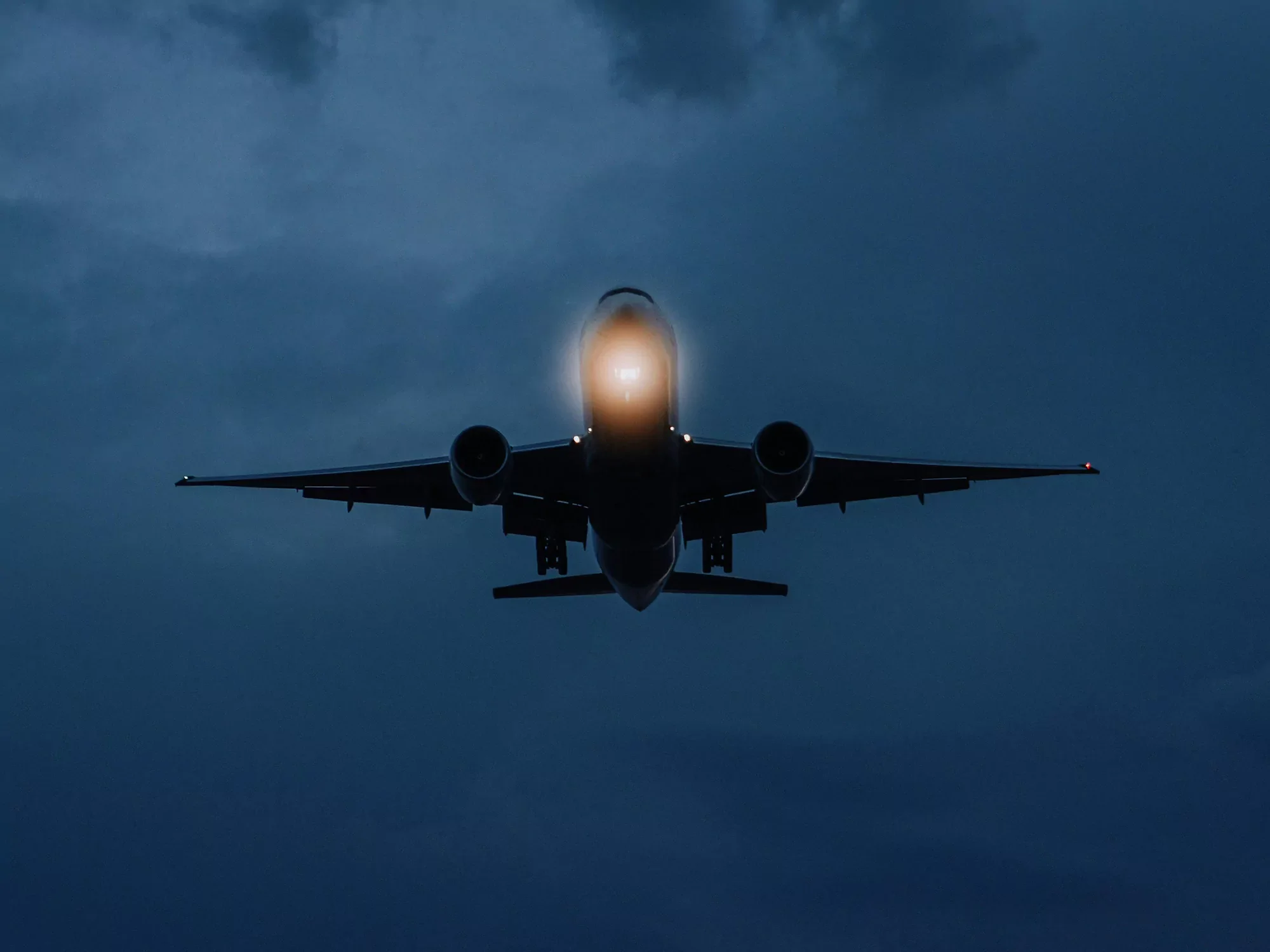 Why do most flights to Europe cross the Atlantic at night?