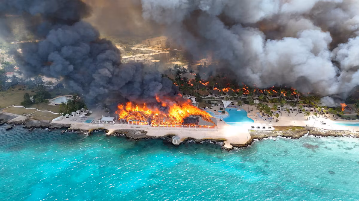A woman was killed and nearly 1,700 tourists evacuated after a hotel fire in the Dominican Republic.