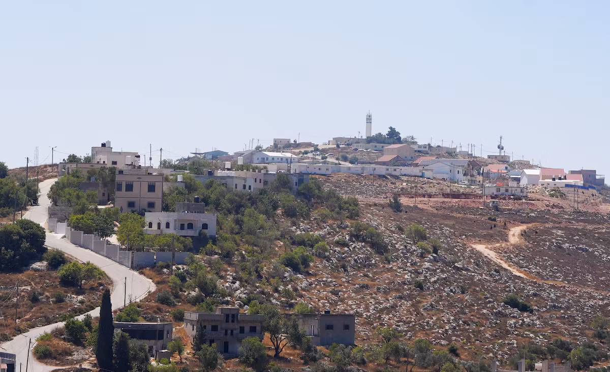 In the West Bank, a Palestinian family finds their house, still under construction, occupied by Israeli settlers.