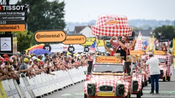 Tour de France — The Tour de France caravan, a popular spectacle that has become a formidable marketing machine
